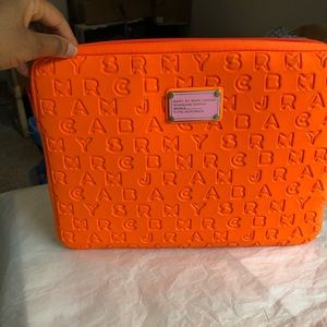 Marc Jacob laptop carrier clutch Orange color